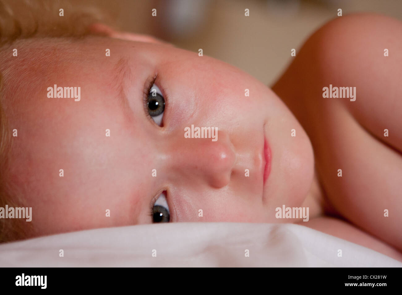 A child with head on pillow Stock Photo Alamy