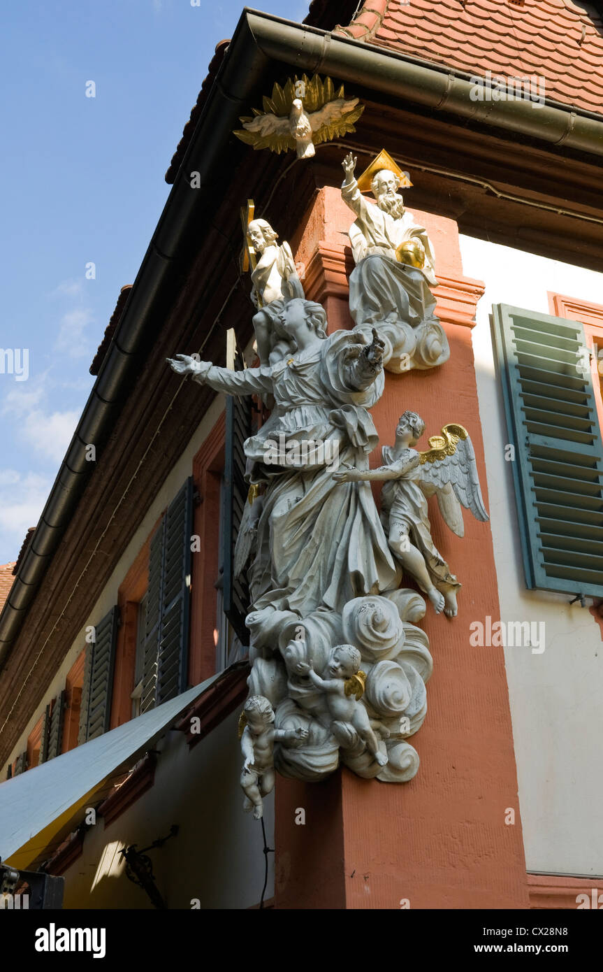 Religious statue on a house in Bamberg, Bavaria, Germany. Stock Photo