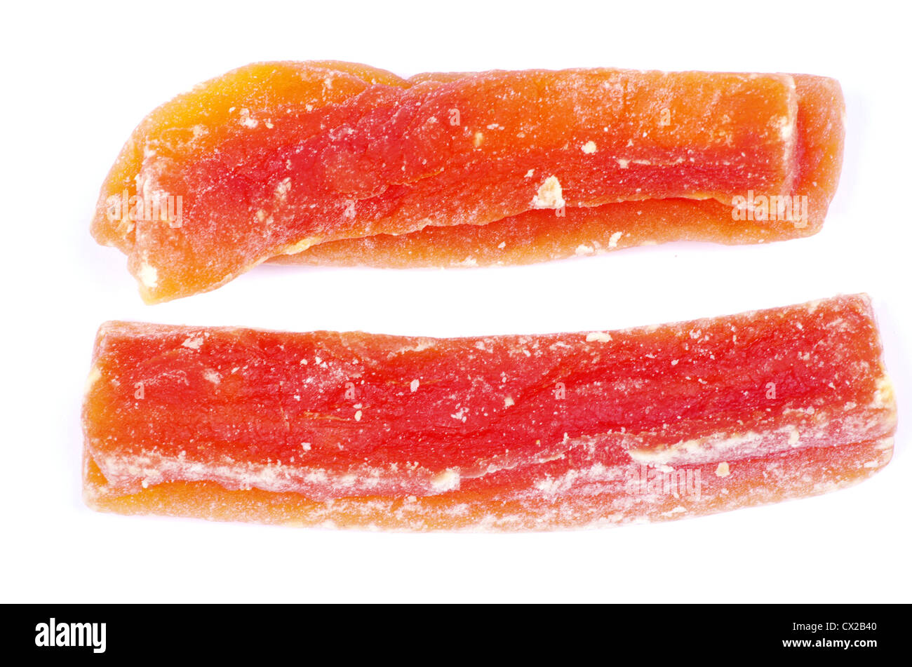 orange dried papaya slices over white background Stock Photo Alamy