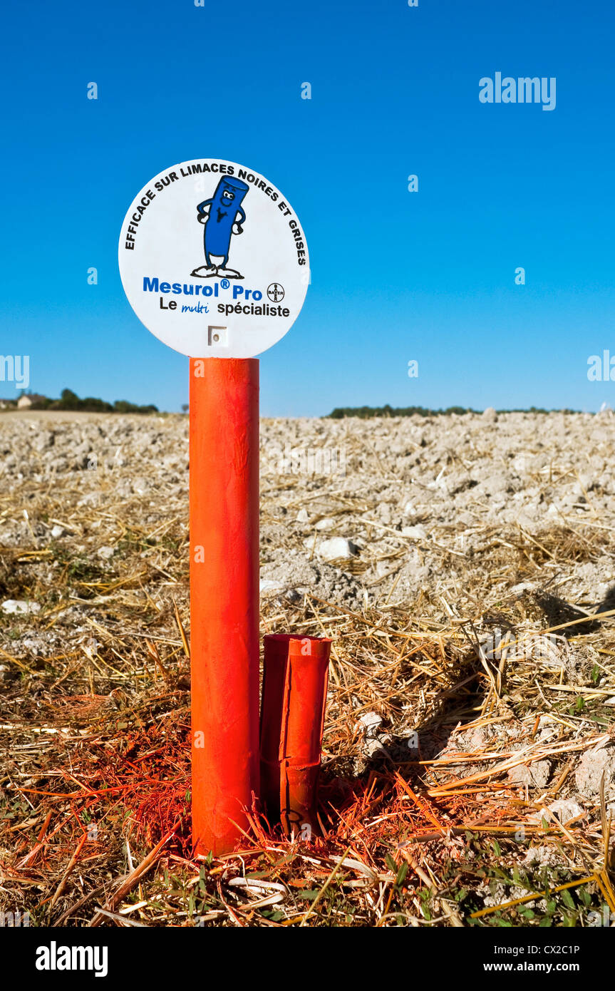 Farm sign 'Mensurol Pro / Bayer' for anti-slug treatment - France. Stock Photo