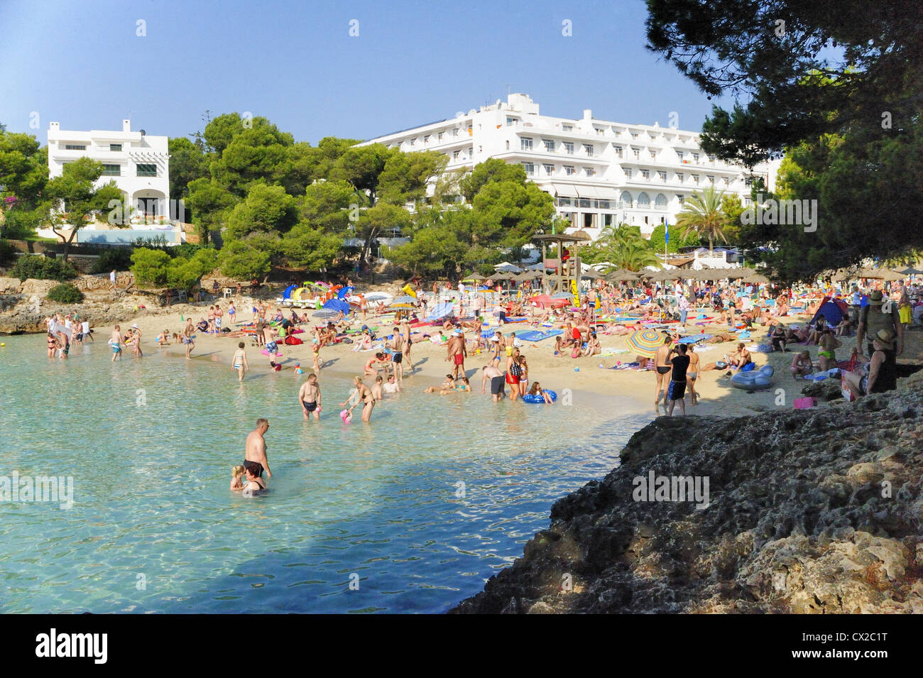 Cala Gran Beach, Cala D'Or with Hotel Rocador Stock Photo