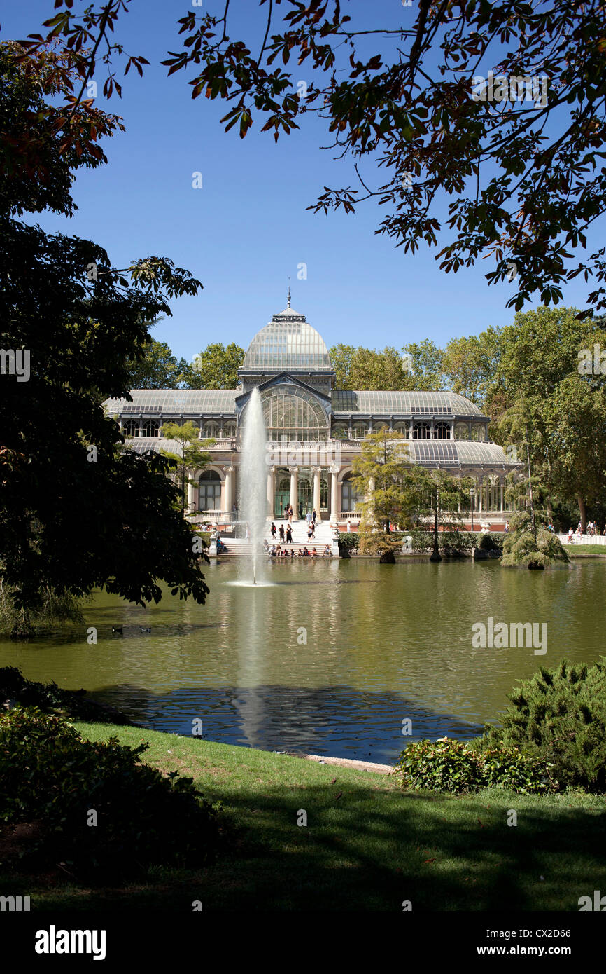 The Palacio de Cristal is a vast glass conservatory that stands in the centre of Retiro Park, Madrid, Spain. Stock Photo