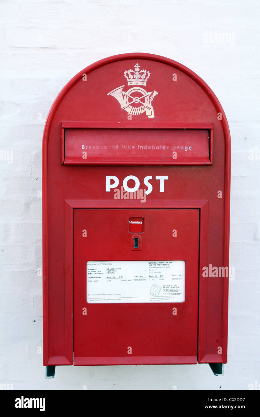 Red postbox on the Danish island Bornholm (Denmark) Stock Photo