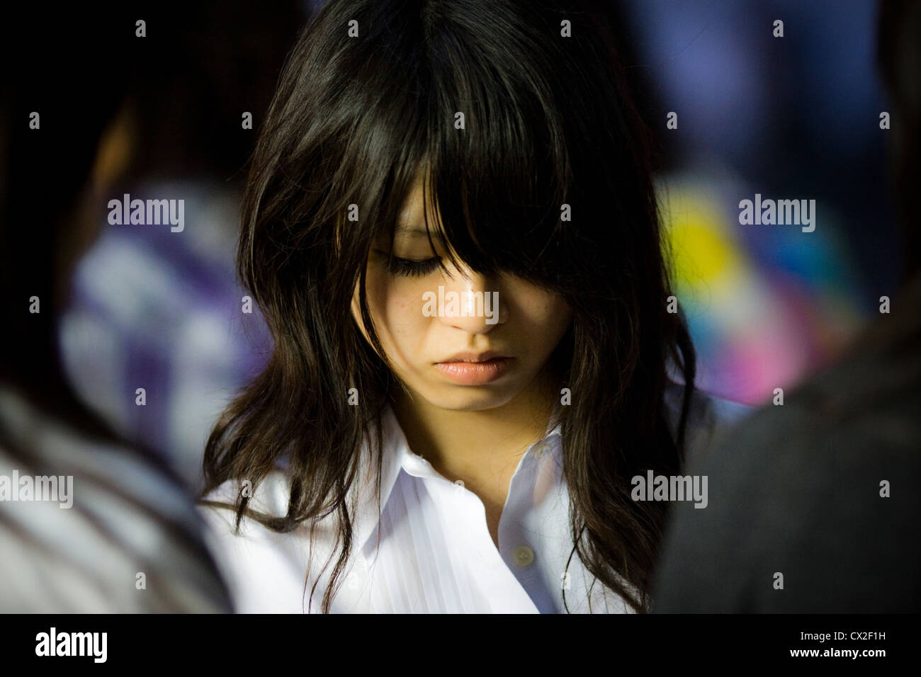 Portrait of a Japanese young woman in Shinjuku, Tokyo Stock Photo