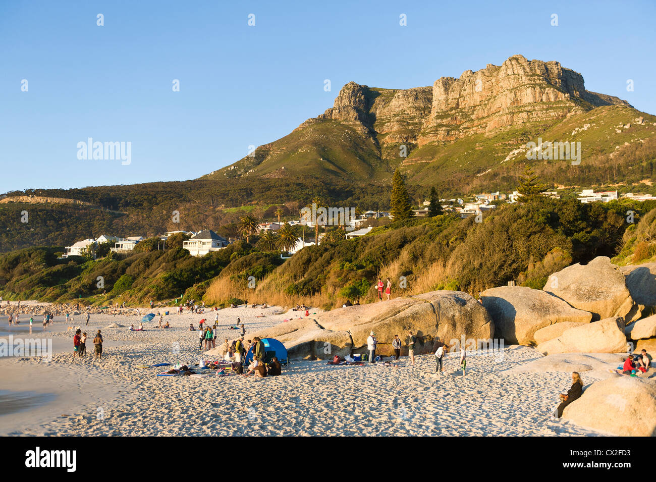 People on the beach of Llandudno, Western Cape, South Africa Stock Photo