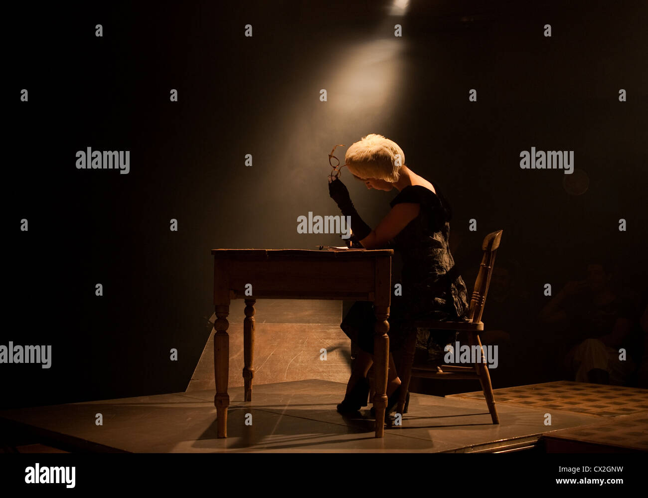 Woman at writing desk Stock Photo - Alamy