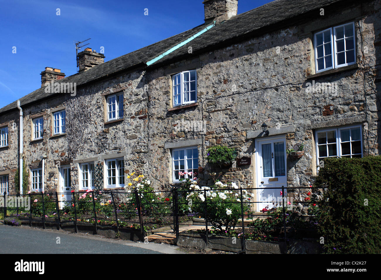 Rose cottages, Wensley village, North Yorkshire, England, UK Stock Photo