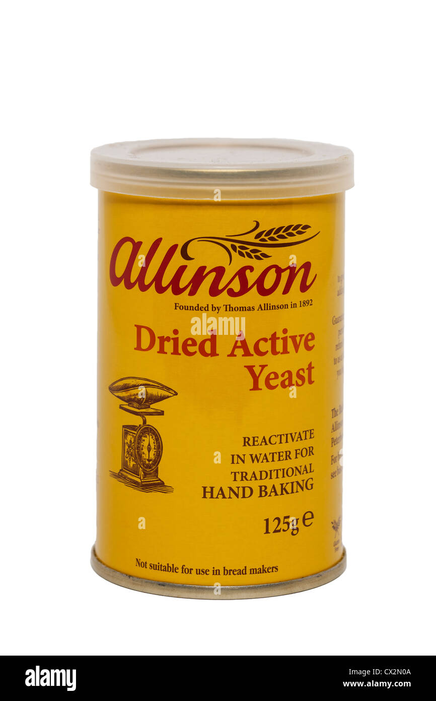 A tub of allinson dried active yeast on a white background Stock Photo