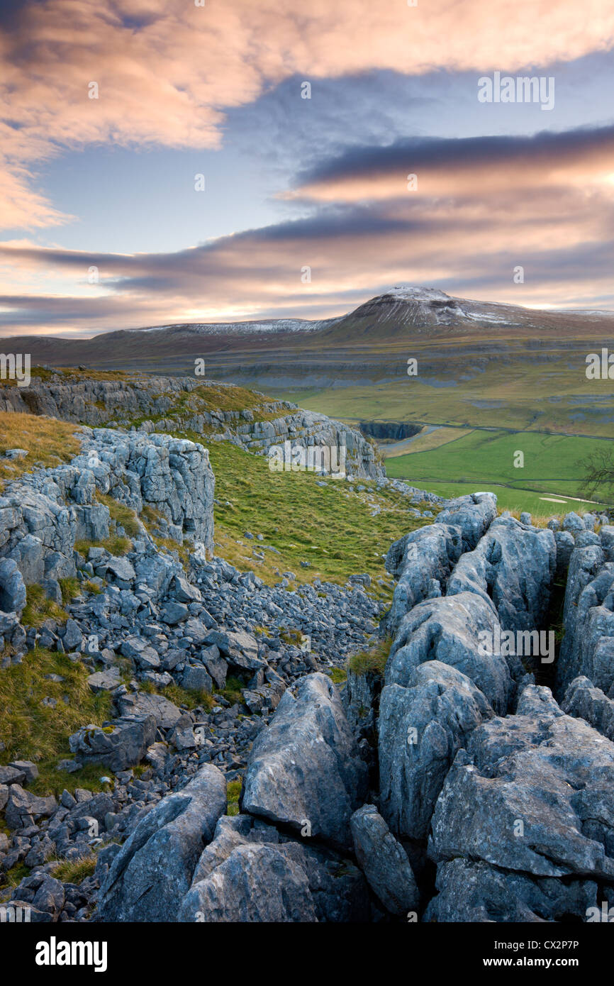 Snow capped Ingleborough from the limestone pavements on Twistleton Scar, Yorkshire Dales National Park, North Yorkshire Stock Photo