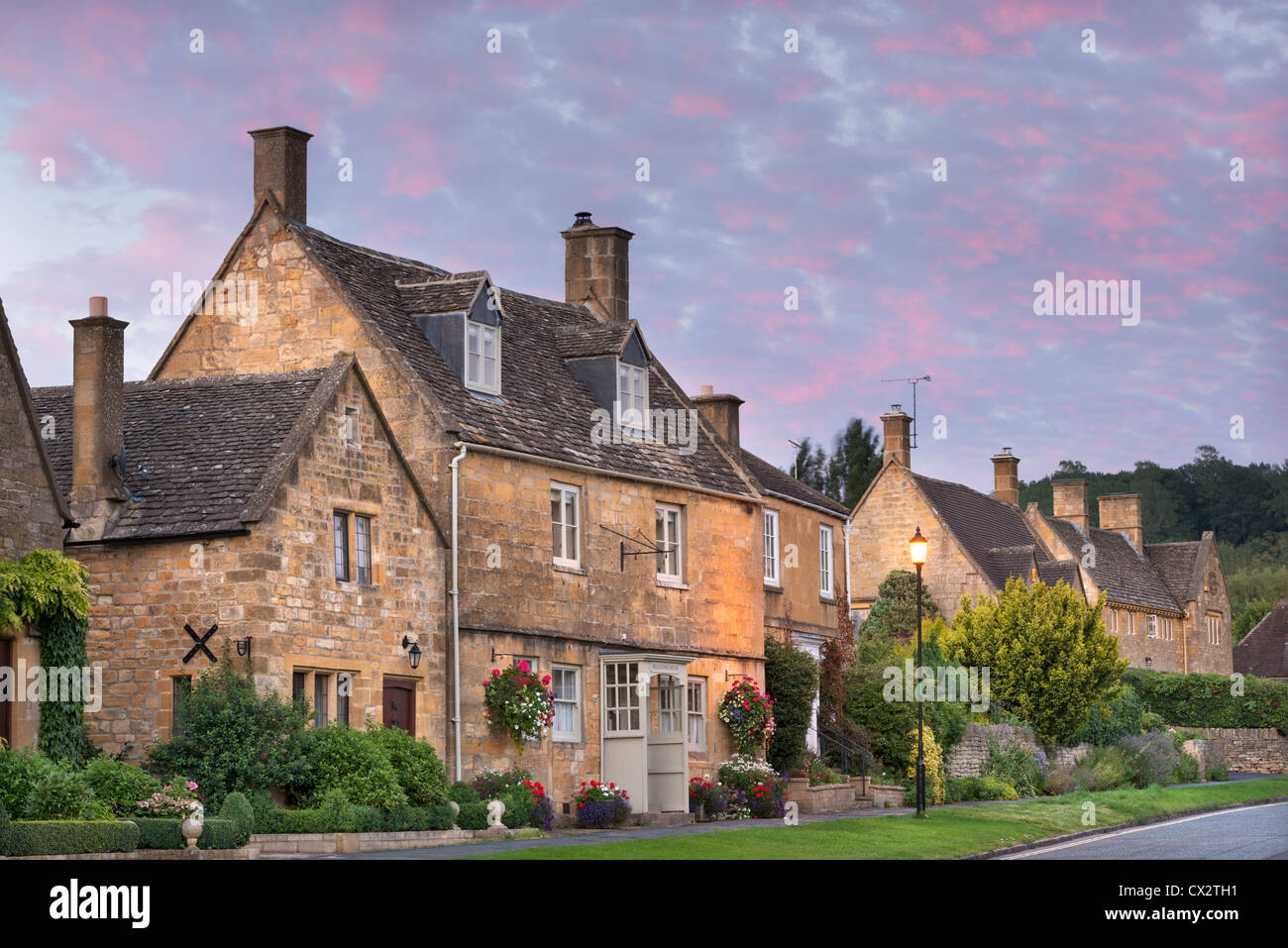 Pretty houses in the picturesque Cotswolds village of Broadway, Worcestershire, England. Autumn (September) 2012. Stock Photo