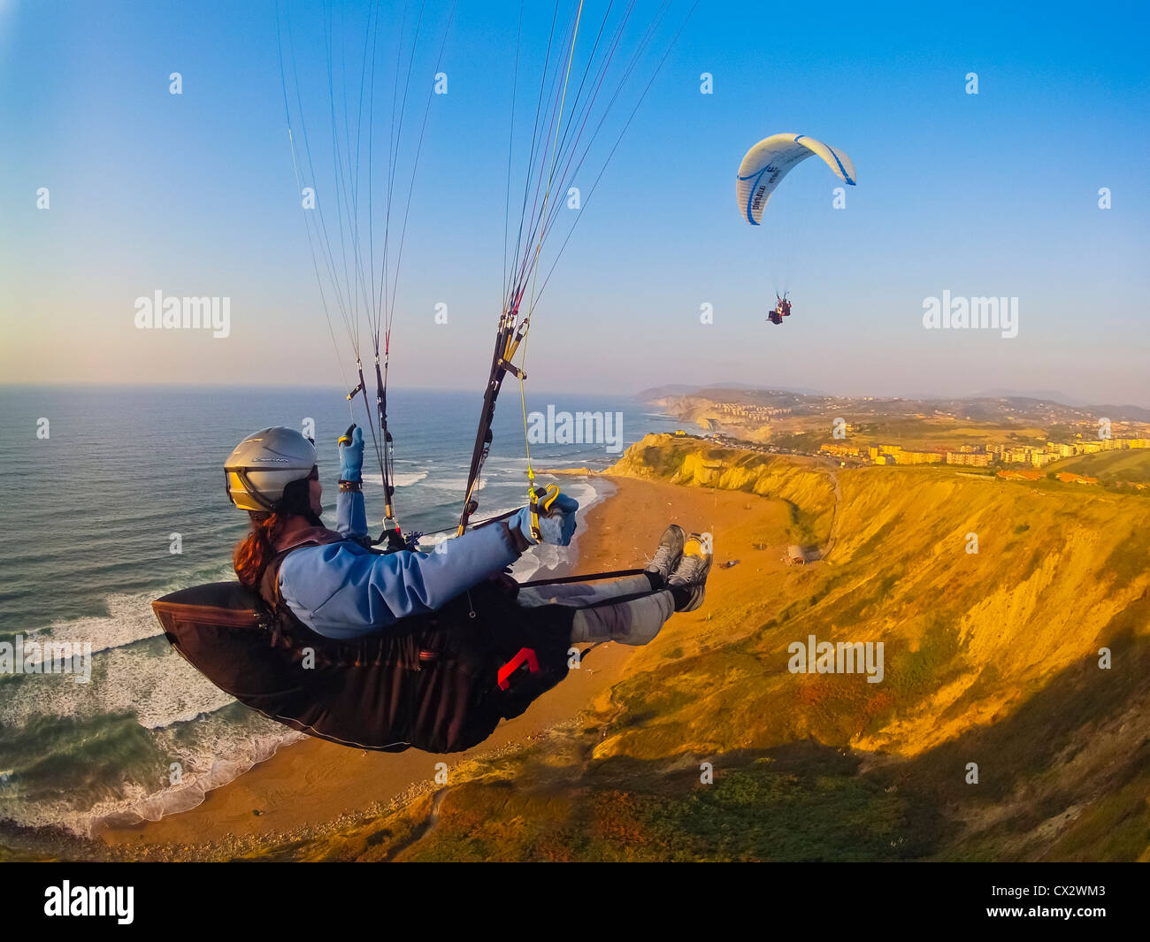 paragliding, free flying over the coast of Spain, Sopelana, Basque country, sport, to fly, adventure, risk, dangerous, sky, air Stock Photo