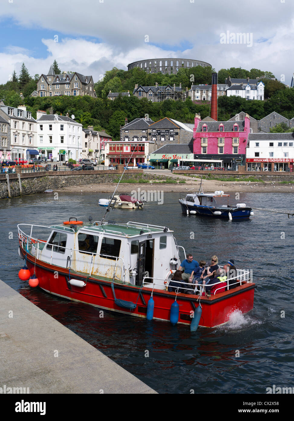 dh North pier harbour Scotland OBAN ARGYLL Visiting tourists boat trip seafront scottish tourist holiday Stock Photo