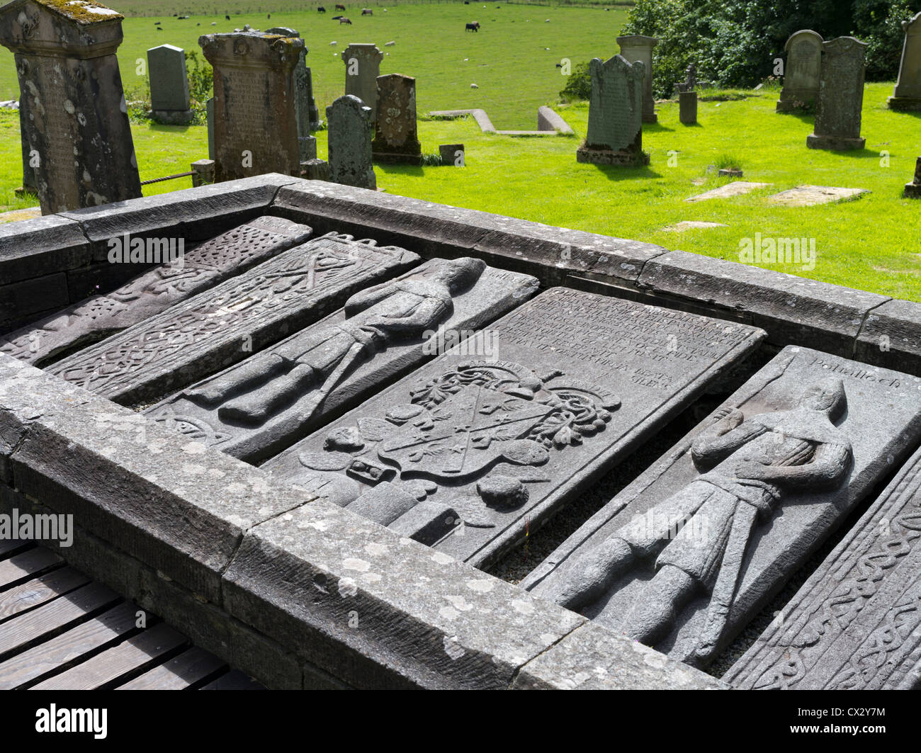 dh Kilmartin Graveyard KILMARTIN ARGYLL Scottish stones carved tomb cemetry engraving tombstone uk slab stone scotland grave slabs gravestones Stock Photo