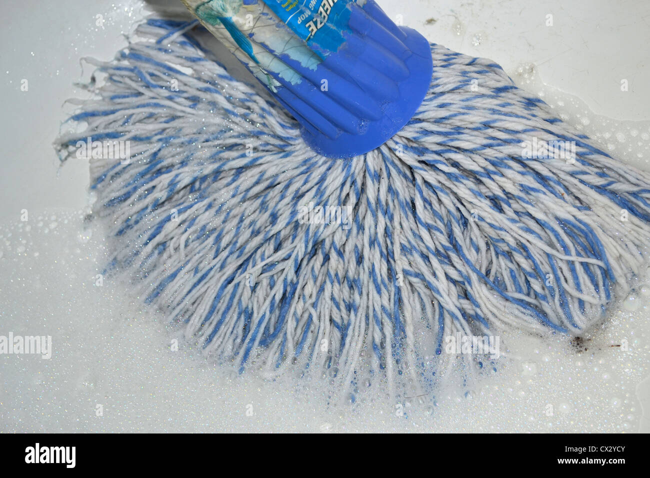 cleaning floor with a mop Stock Photo Alamy