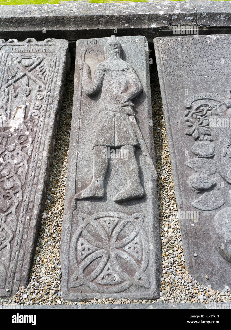 dh Mediaeval slabs tombstones KILMARTIN GRAVEYARD ARGYLL SCOTLAND Stones carved graveslabs decorated uk templar scottish slab stone grave Stock Photo