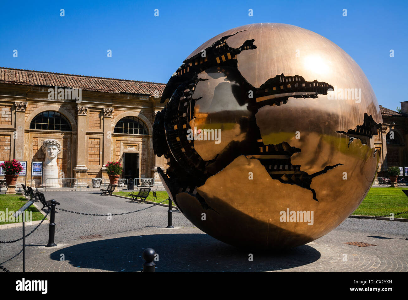 Sphere Within Sphere sculpture by Pomodoro in the Cortile della Pigna, Vatican Museum Gardens, Rome, Lazio, Italy. Stock Photo