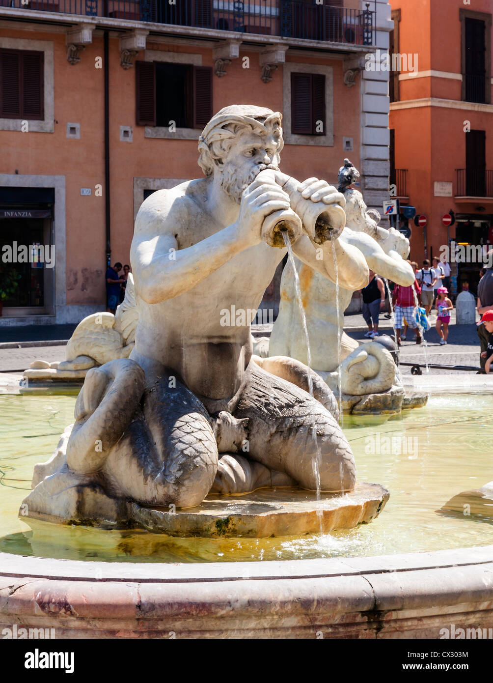 Statue of Triton depicted as a Merman, Fontana del Moro, Piazza Navona, Lazio, Rome, Italy. Stock Photo