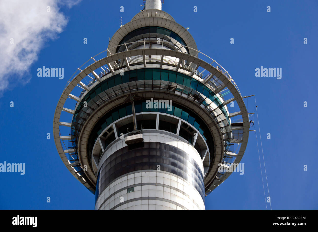 Closeup of the Sky Tower observation platform and space needle looking up, Auckland New Zealand skyline. Stock Photo