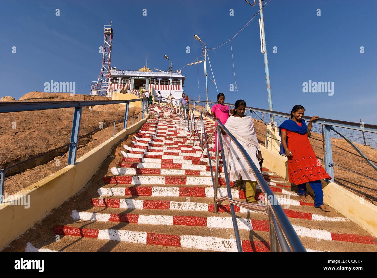 Elk201-4892 India, Tamil Nadu, Tiruchirappalli, Rock Fort Temple, pilgrims descending stairway from temple Stock Photo