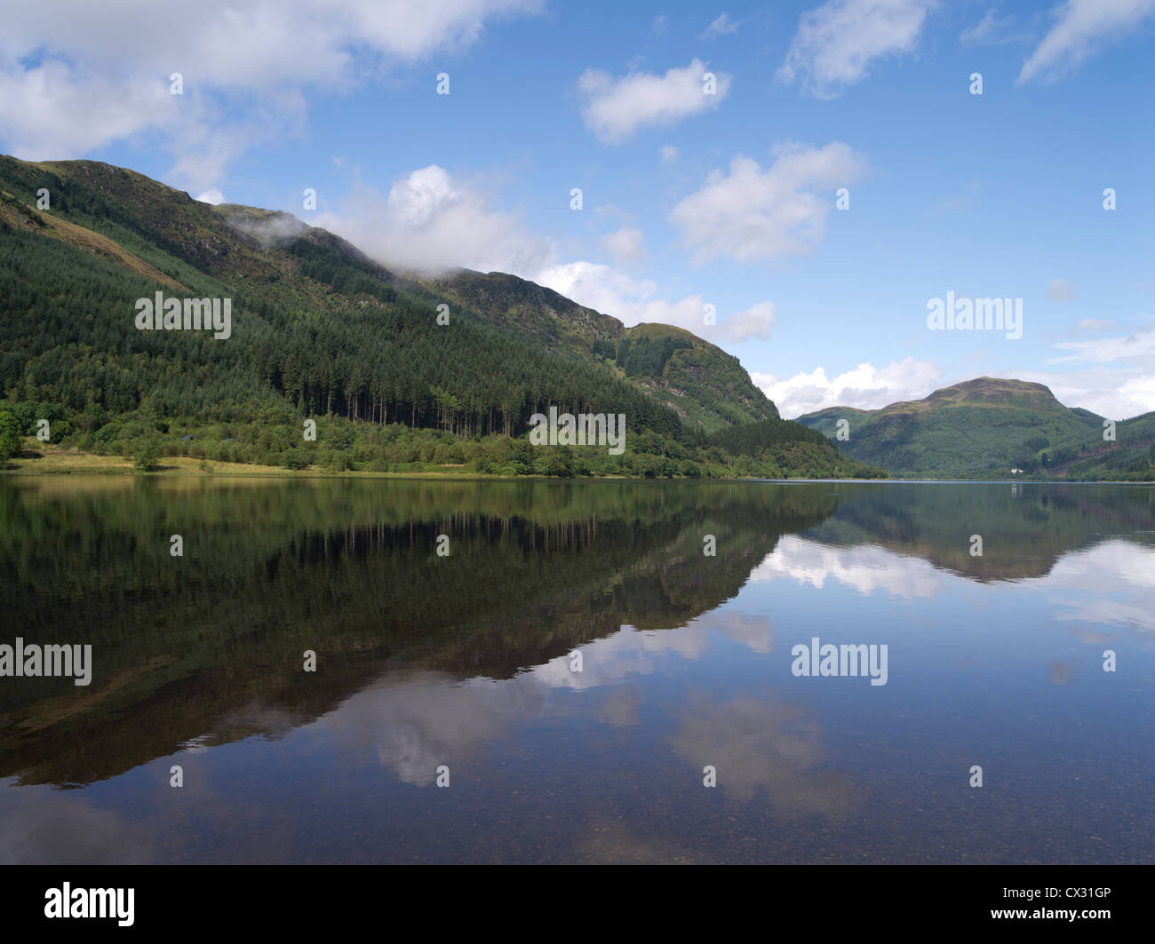 dh Loch lubnaig trossachs STRATHYRE HIGHLANDS STIRLINGSHIRE Scottish Forest trees Trossach national park scenic highland summer scotland quiet lochs Stock Photo