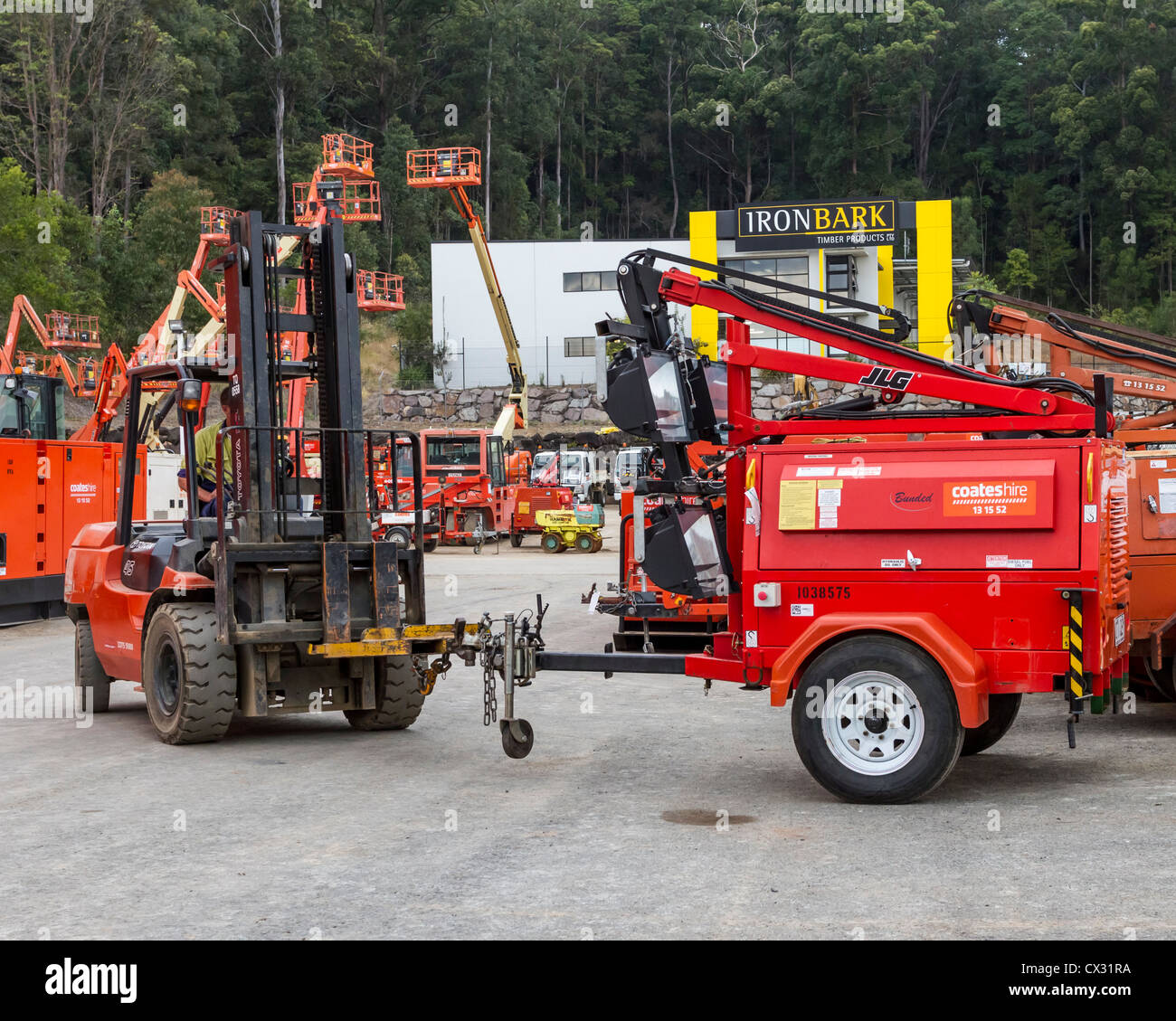 Forklift positioning mobile industrial lighting machinery for hire at Sunshine Coast, Queensland, Australia Stock Photo