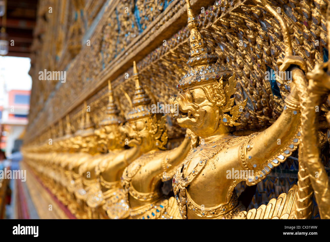 Wat of the Emerald Buddha guard at the grounds of the Grand Palace Bangkok Thailand Stock Photo