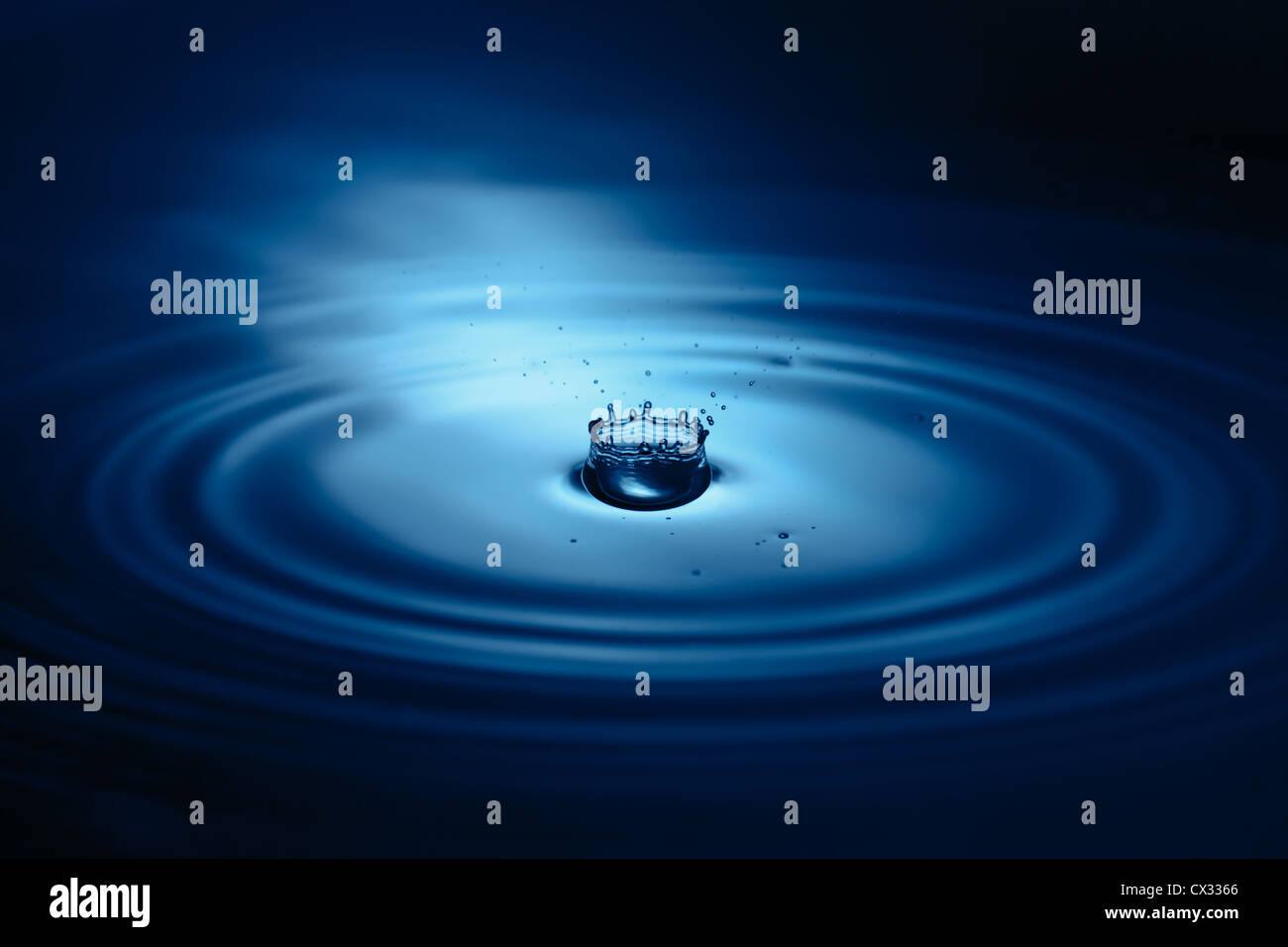 Splash of water drop closeup Stock Photo