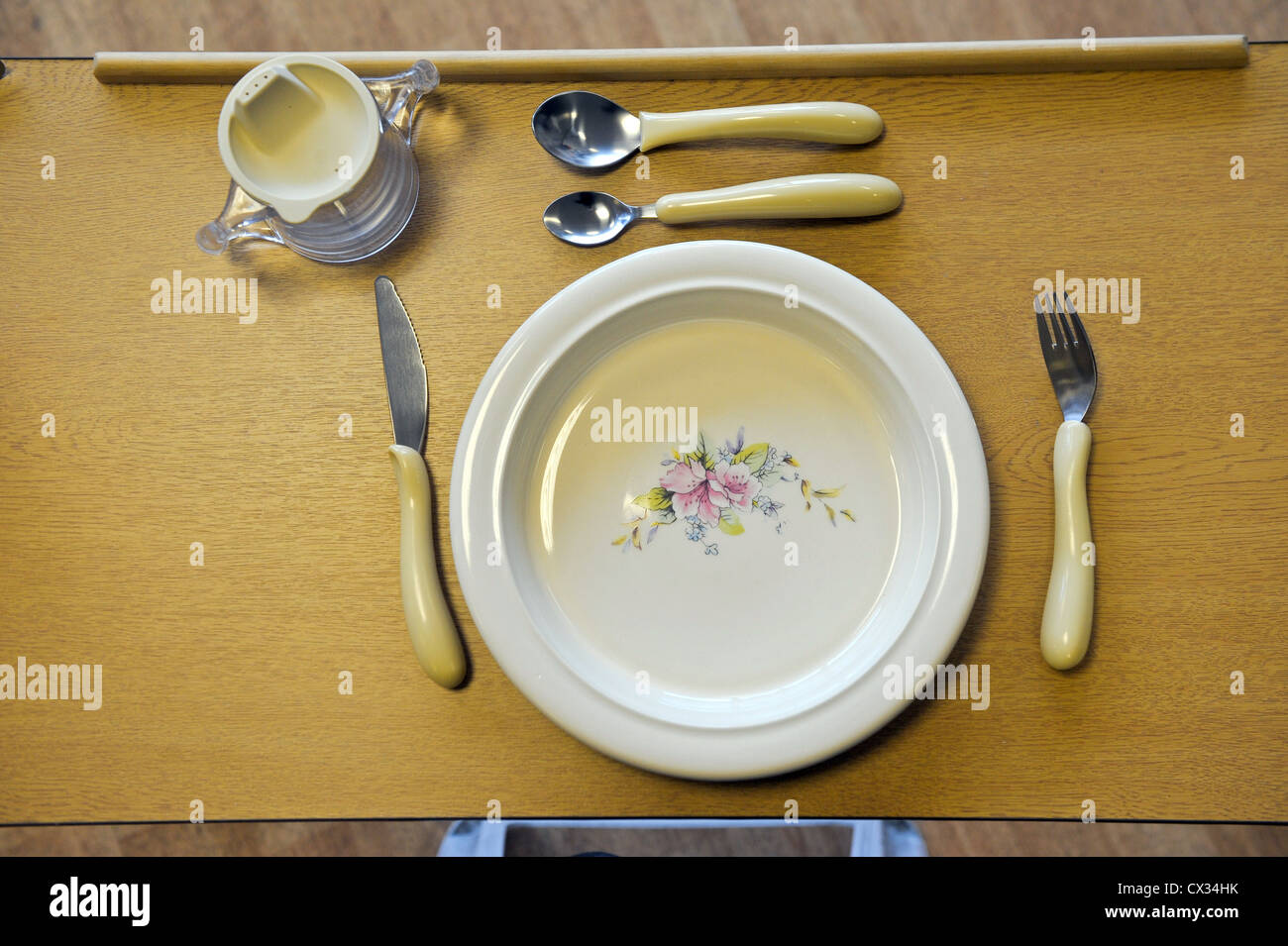 Adapted cutlery for disabled people Stock Photo Alamy