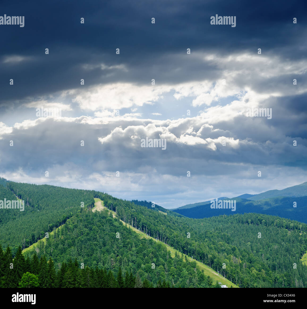 Beautiful green mountain landscape under dramatic sky in Carpathians ...
