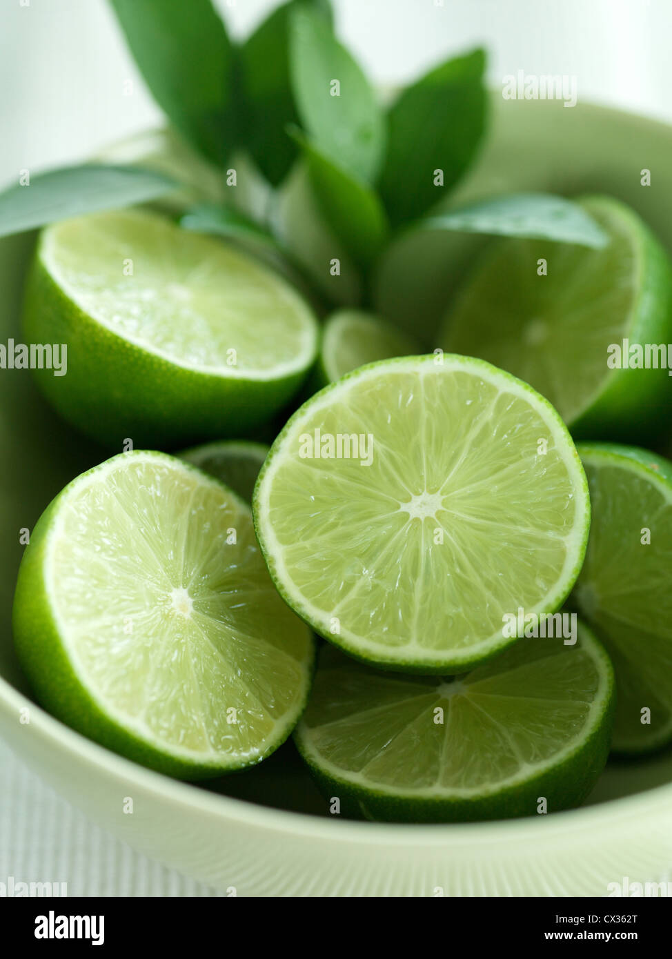 A bowl of fresh limes Stock Photo