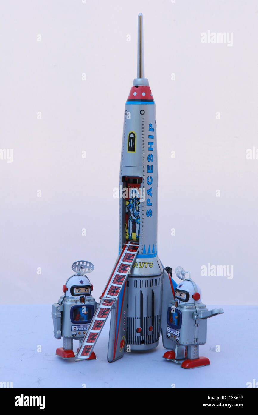 Space Rocket and Astronauts Tin Toy Stock Photo