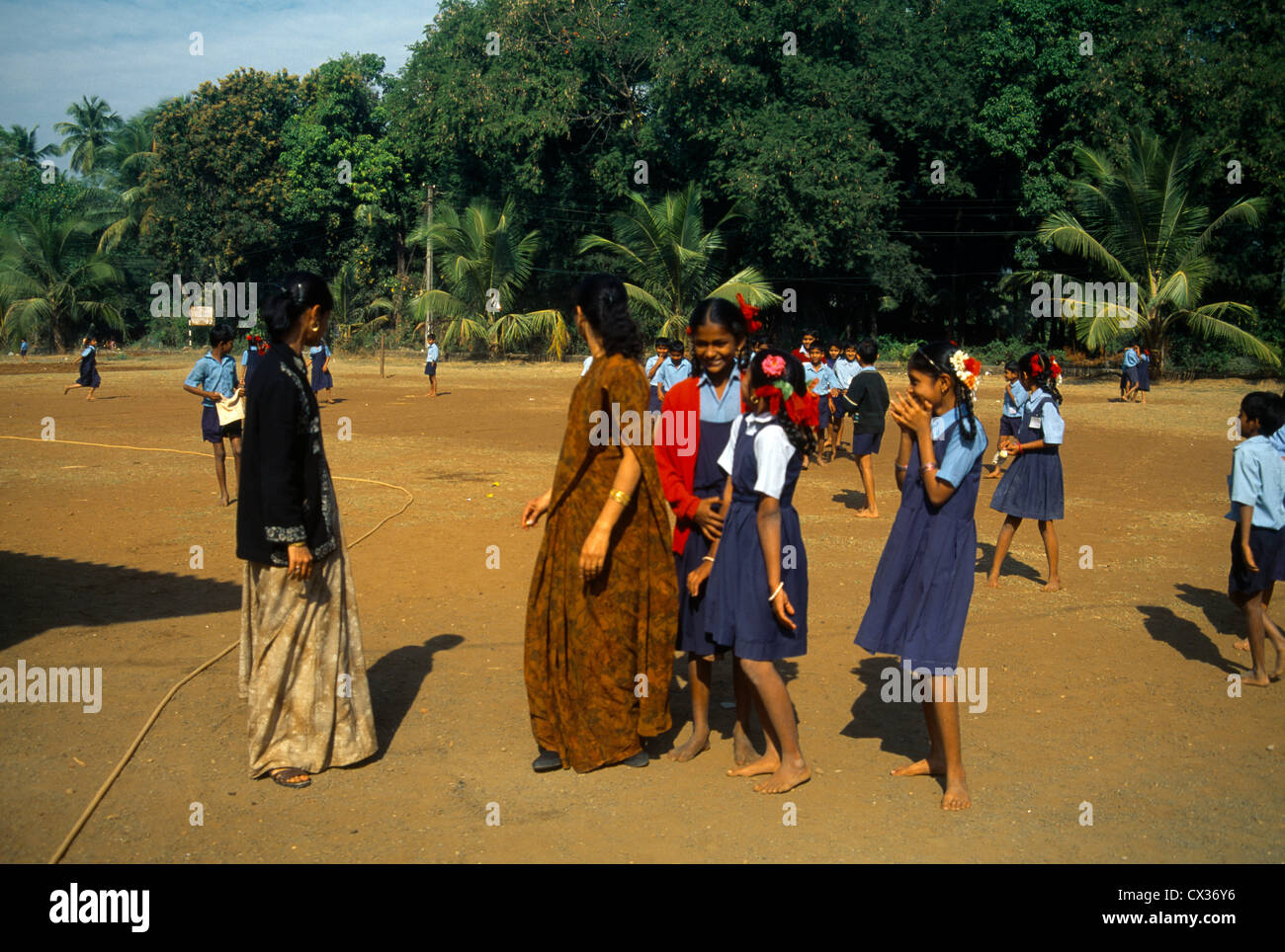 Maharastra India Children & Teachers In Playground Kihim Village Stock Photo