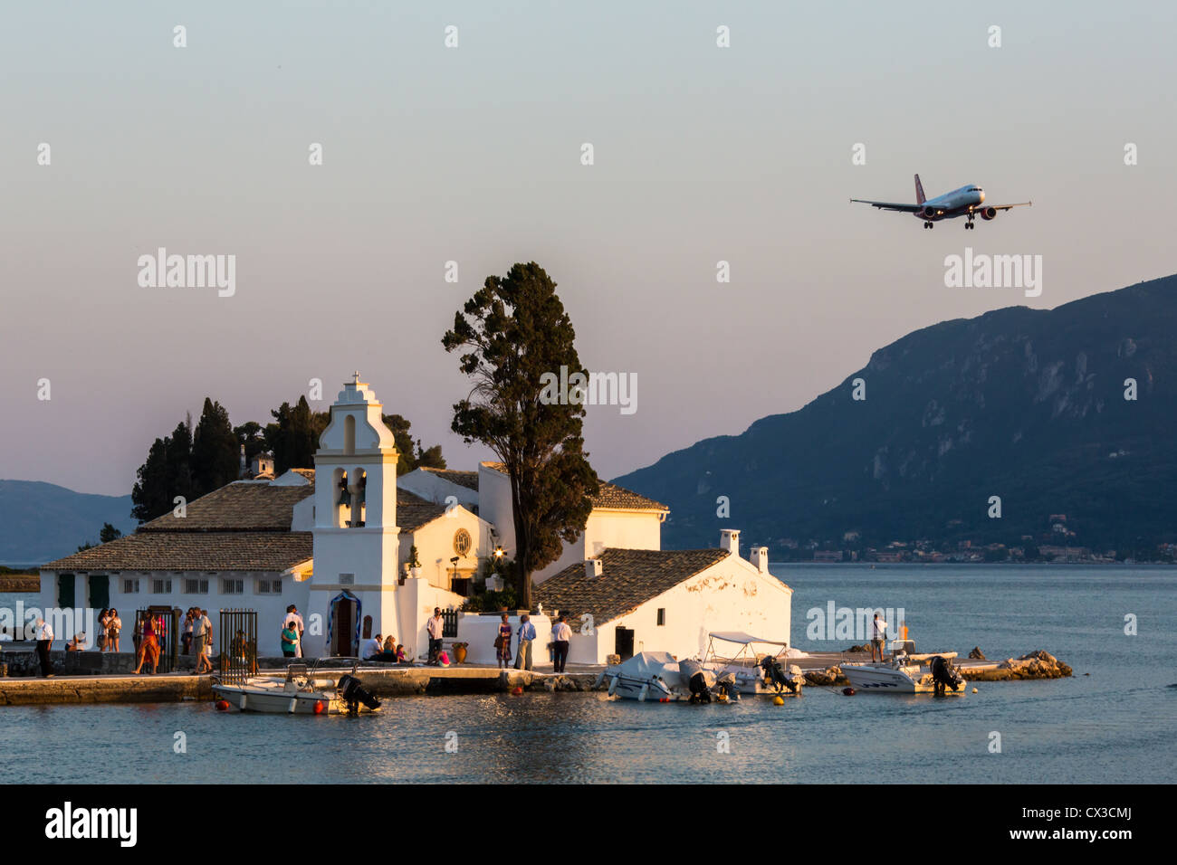 Passenger plane lands at the Kapodistrias International Airport in Kerkyra (Corfu town), Corfu, Ionian Islands, Greece. Stock Photo