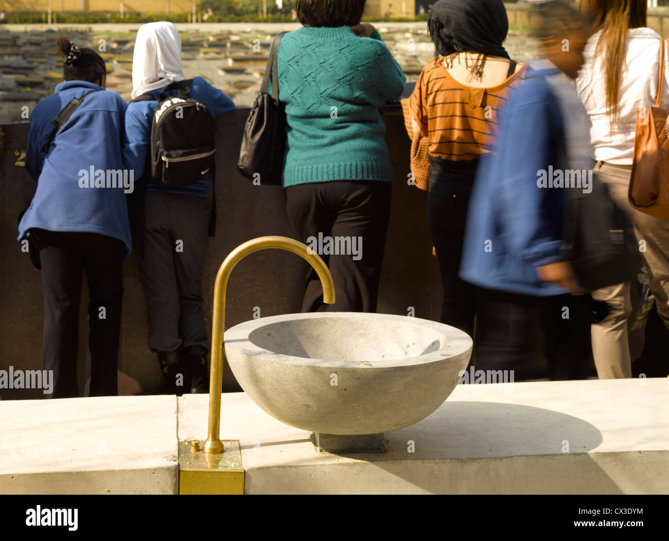 Novo Cemetery, Queen Mary University, London, United Kingdom. Architect: Seth Stein, 2012. Overall View with children looking to Stock Photo