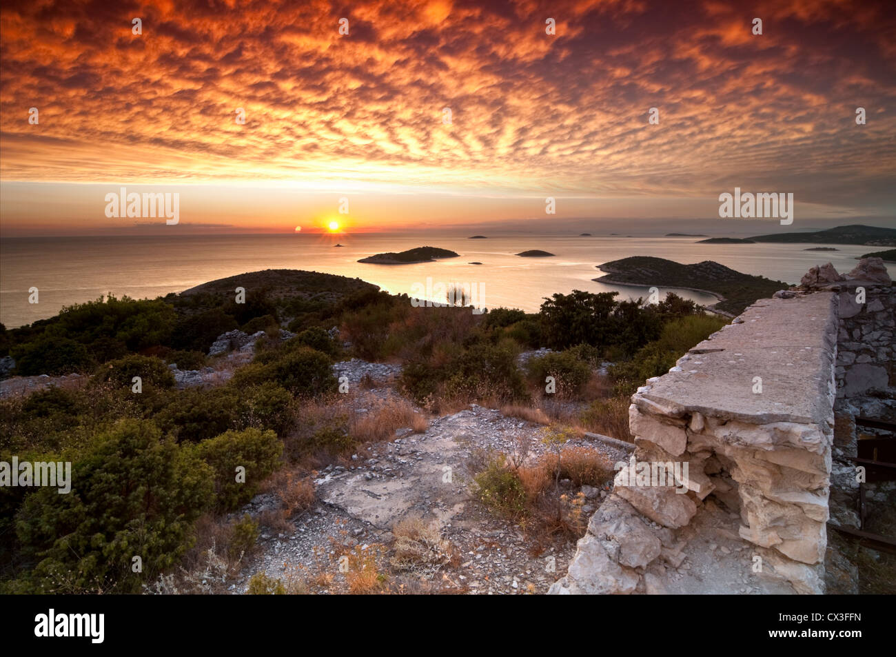 Sunset view over Adriatic sea from the ruins of old fort. Stock Photo