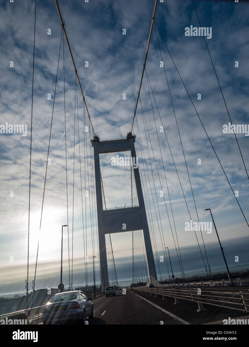 VIEW THROUGH CAR WINDOW OF OLD SEVERN BRIDGE WHILE CAR IS CROSSING BRIDGE FROM ENGLAND INTO WALES. Stock Photo