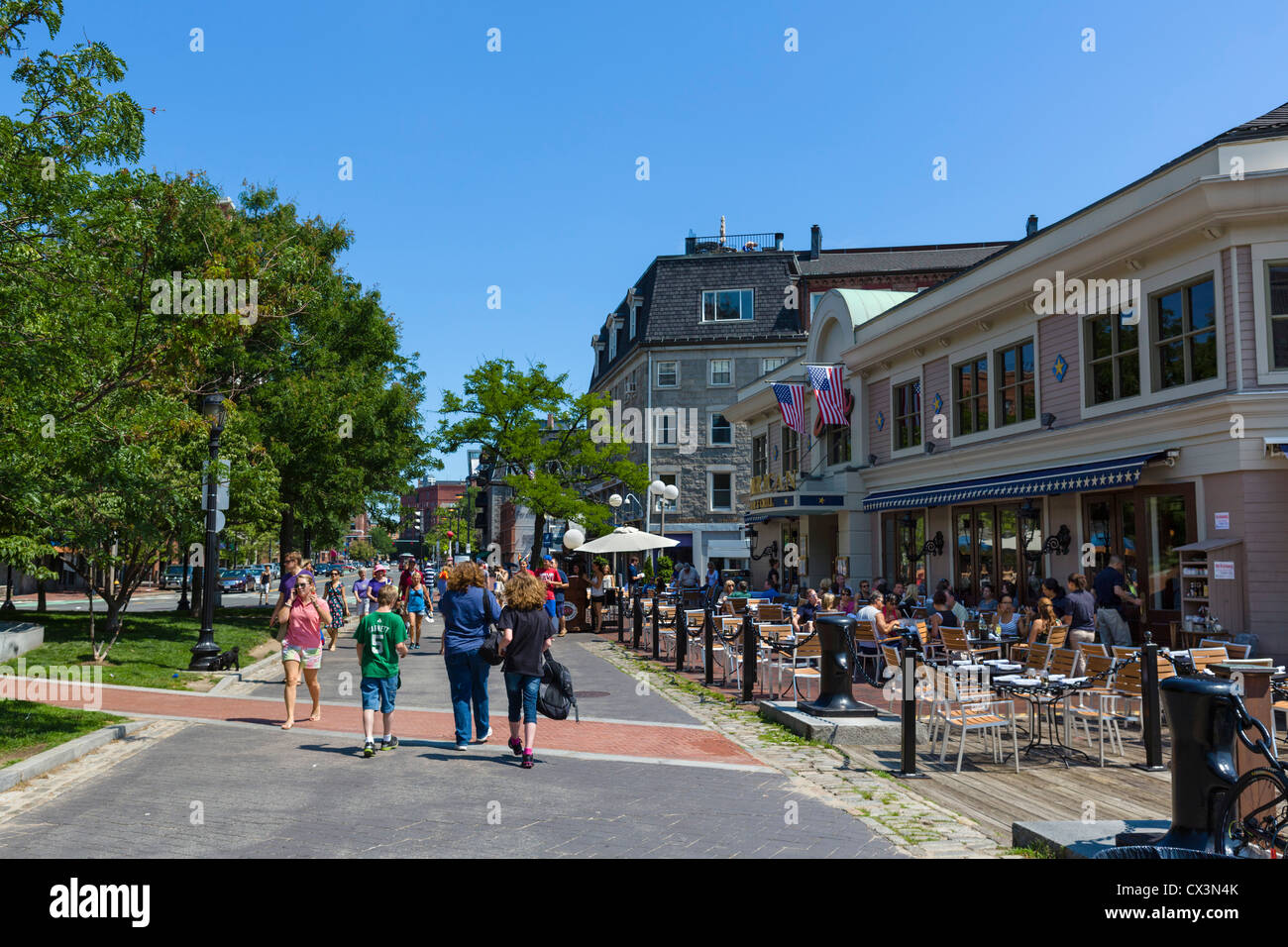 Harborwalk with Joe's American Bar and Grill to the right, Boston Harbor, Boston, Massachusetts, USA Stock Photo