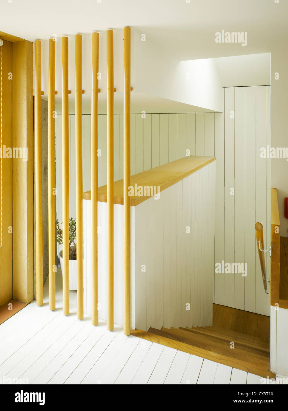 Recasting Extension & Refurbishment, Dundrum, Ireland. Architect: Donaghy + Dimond, 2011. View of stairs showing white painted c Stock Photo