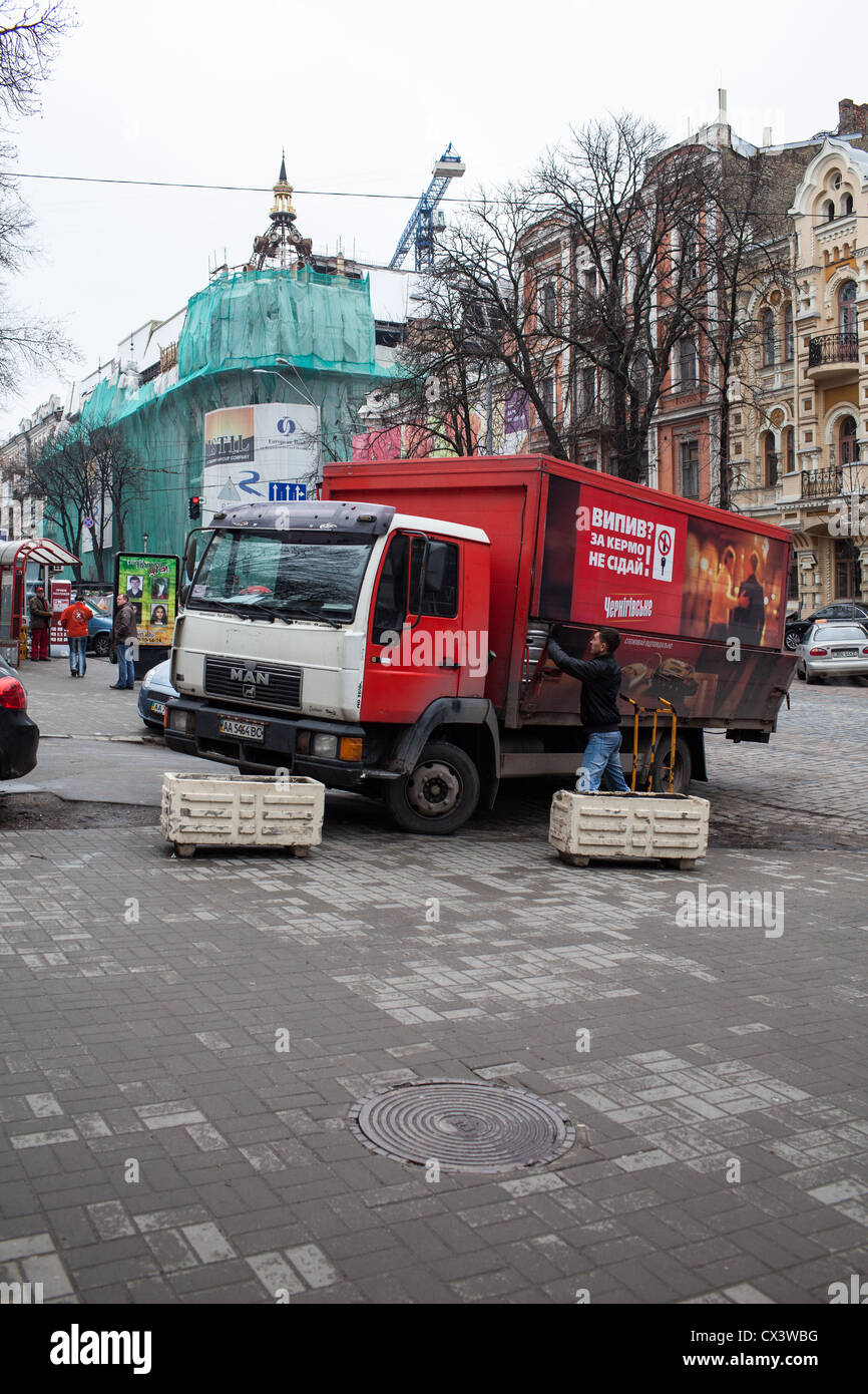 Red delivery truck of Chernigivske beer, an ukrainian trademark of SUN Interbrew Ukraine in Kiev, Ukraine, Eastern Europe. Stock Photo
