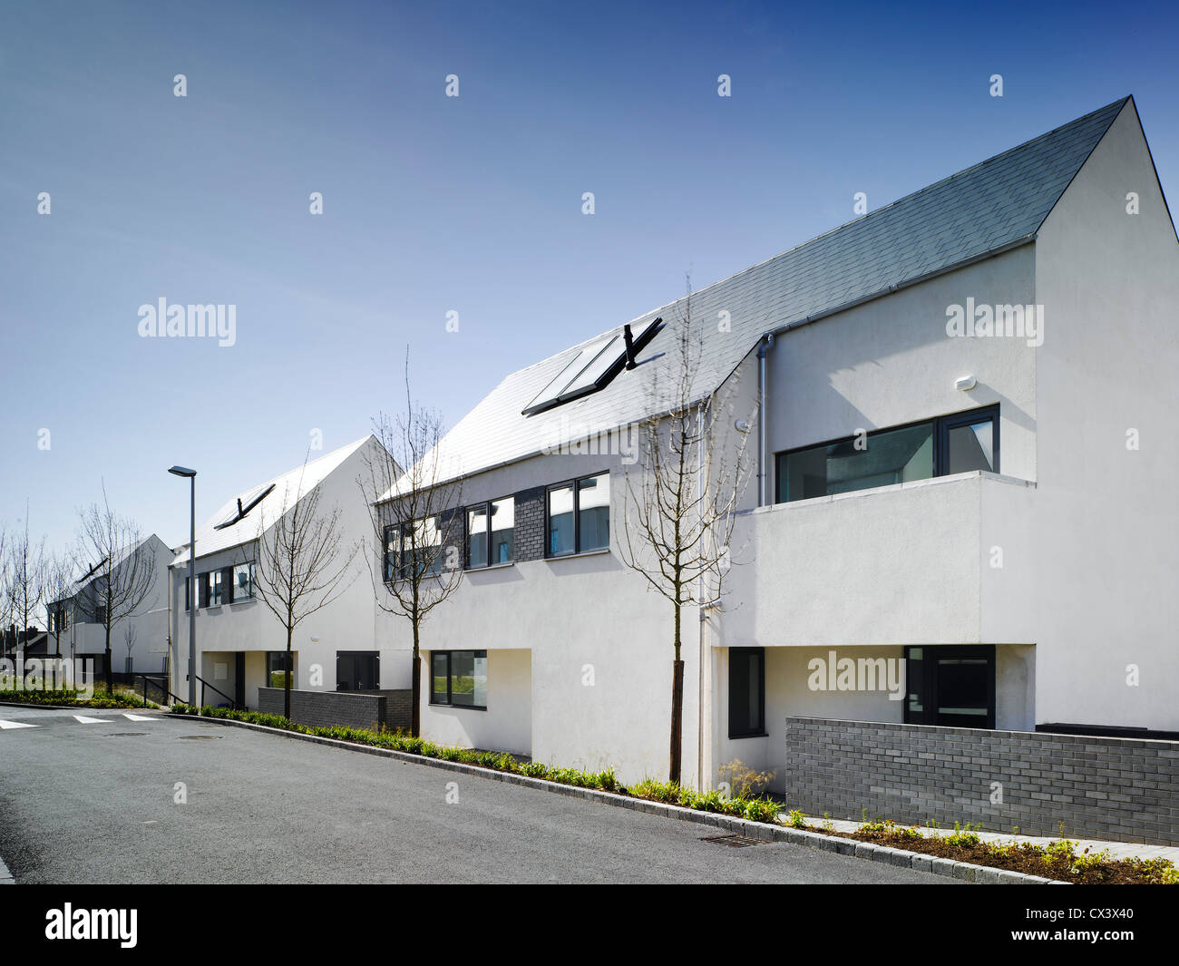 Gleann Bhan, Galway, Ireland. Architect DTA Architects, 2008. View from road of back of houses