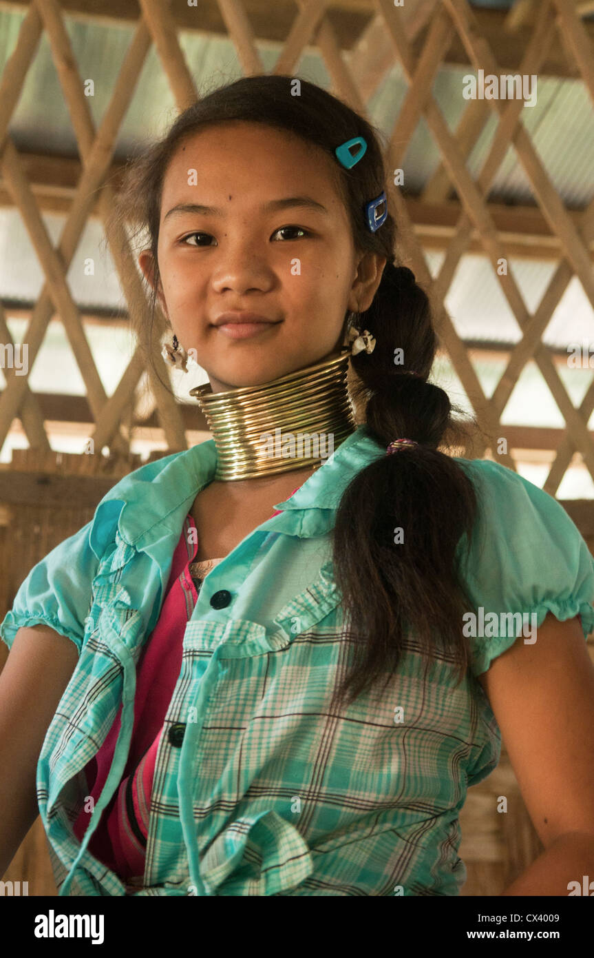 Mo Ji, one of the last young Padaung (Longneck Karen) girls to wear the brass coils in her village of Ban Nai Soi in Thailand Stock Photo