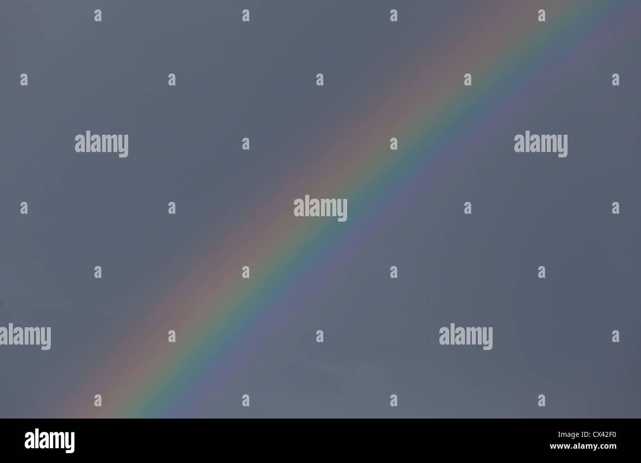 Dark sky rainbow hi-res stock photography and images - Alamy