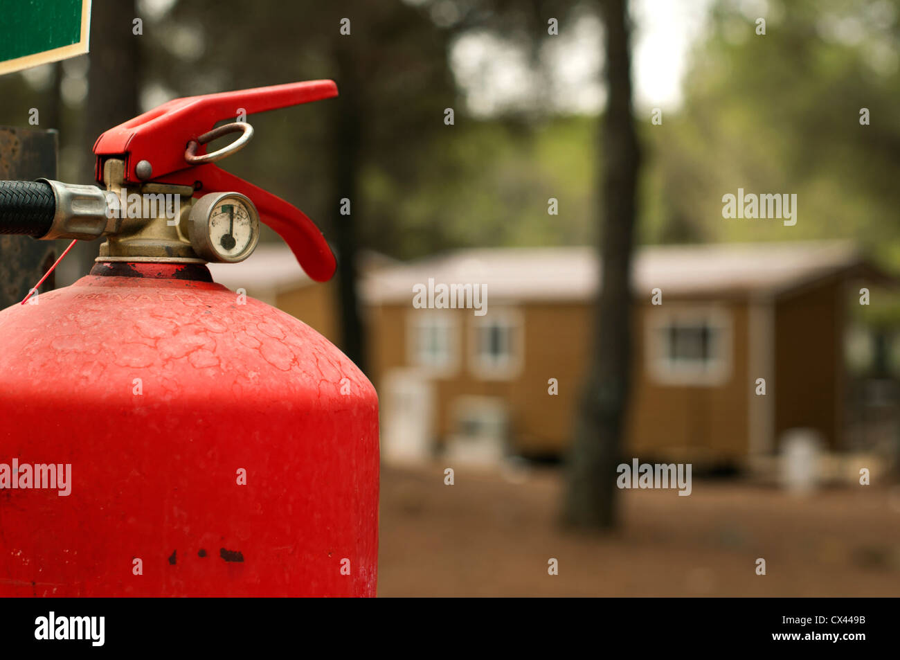 Red fire extinguisher and mobile homes. Fire safety Stock Photo Alamy