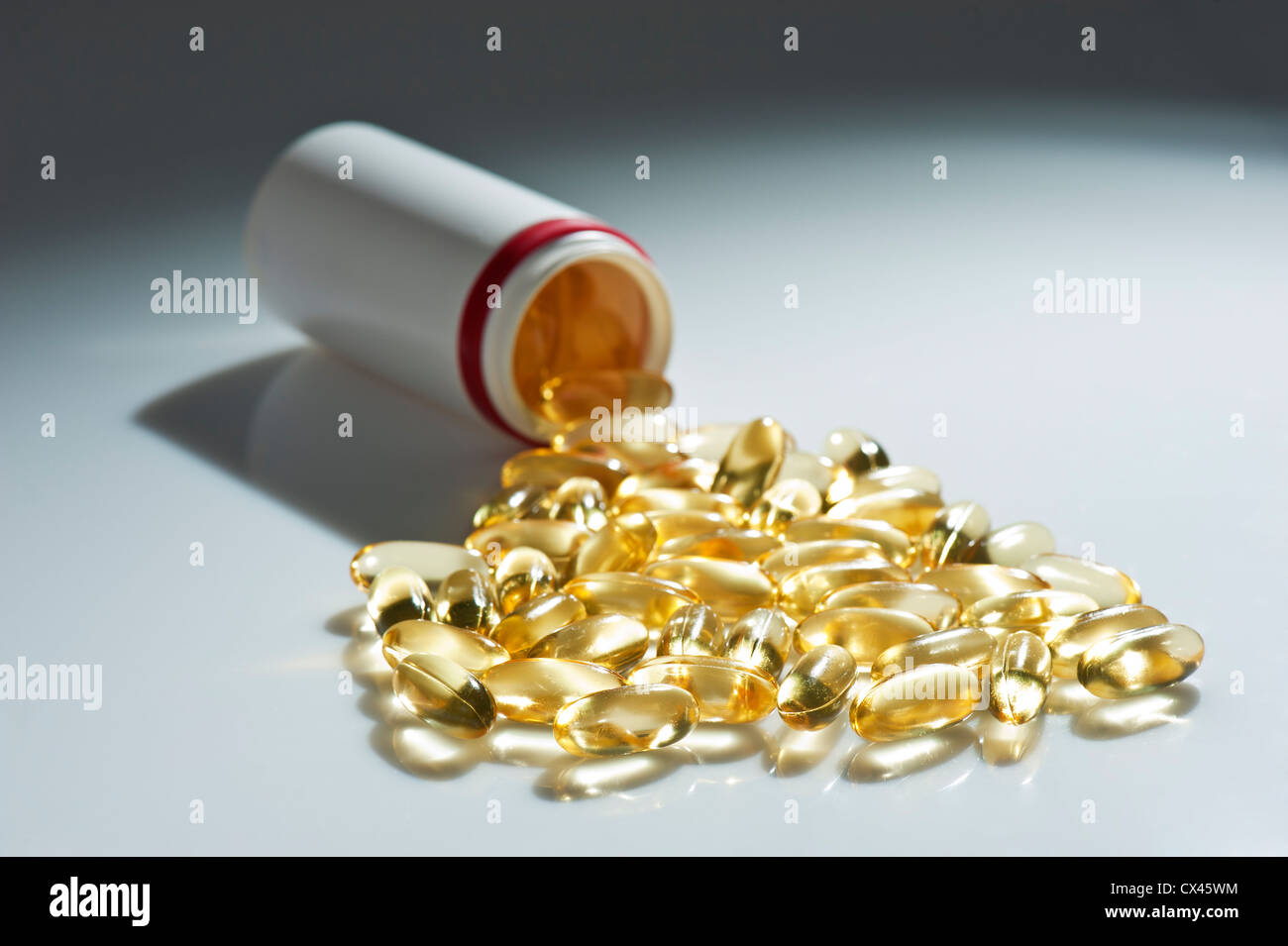 Tablets pipe with undistributed clear capsule isolated Stock Photo