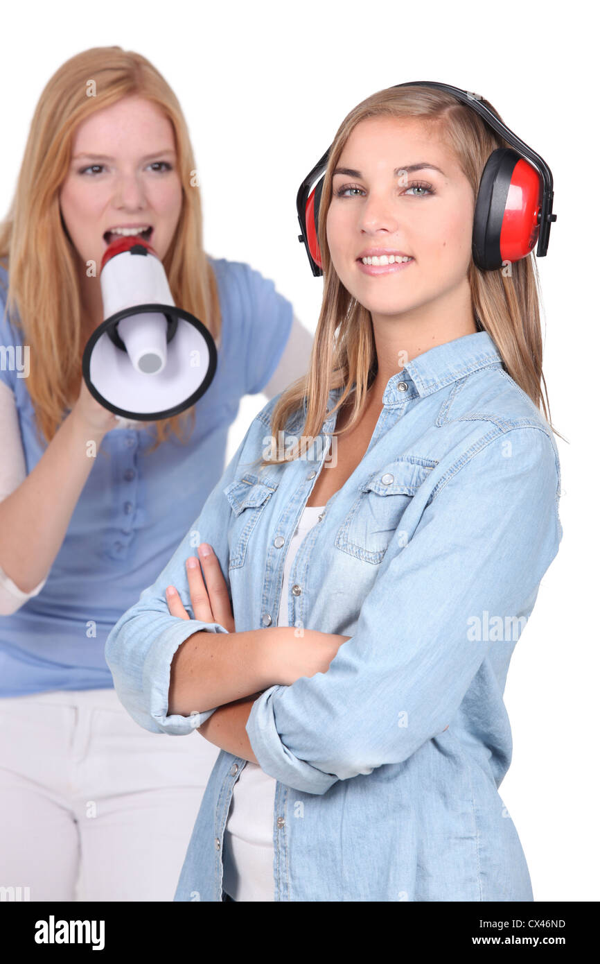 Teenager shouting in loud speaker Stock Photo - Alamy