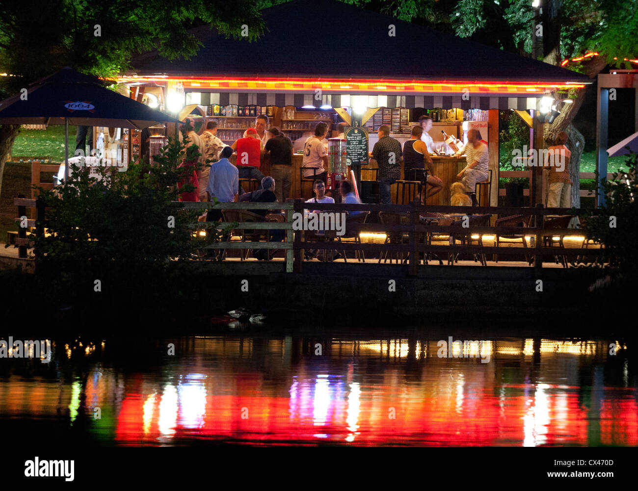 On the right bank of the Allier Lake, the terrace of the 'Tahiti Beach' bar (Vichy - France). Le bar 'Tahiti Plage' à Vichy. Stock Photo