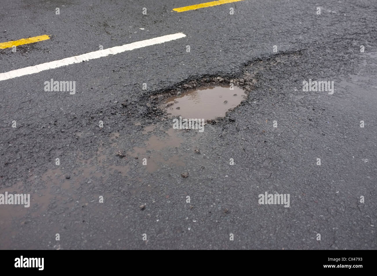 Potholes in roads in Leeds Stock Photo