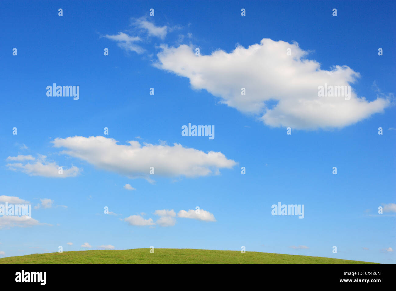 Hill with cloudy blue sky, Bedfordshire, England Stock Photo - Alamy