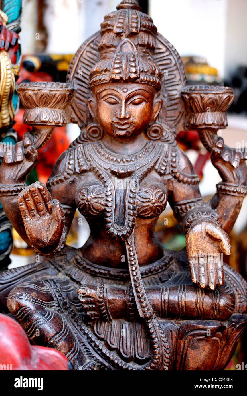 Beautiful wooden craving of an indian goddess Lakshmi devi Stock ...