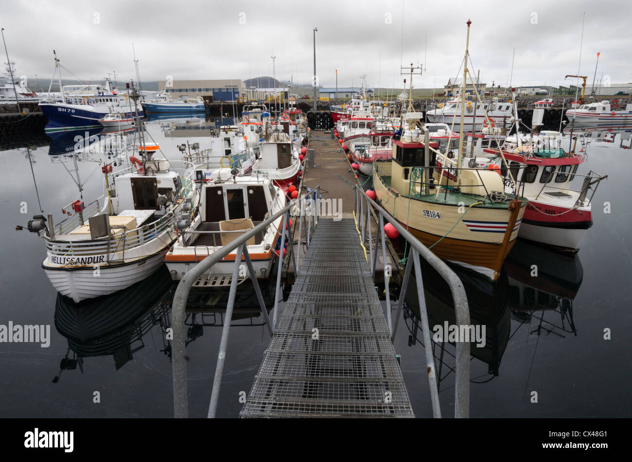 Idle boats in grundafjordur harbour iceland Stock Photo